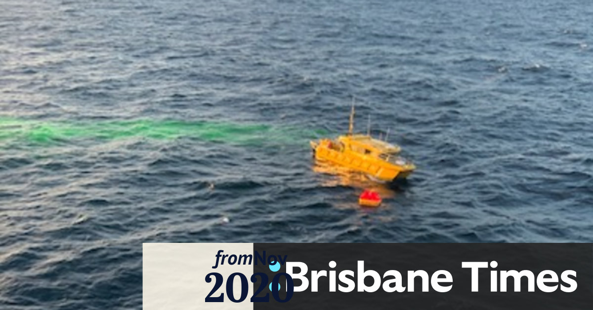 Two fishermen rescued from life raft after boat sinks off Queensland